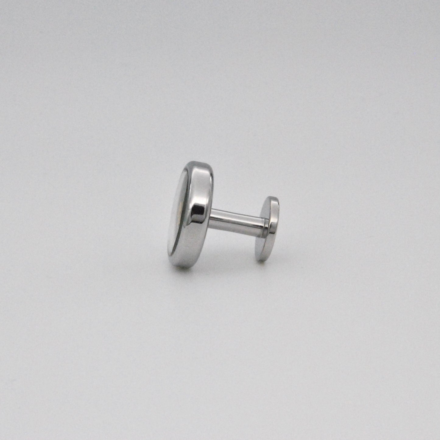 Kinetic Cufflinks with Flywheel